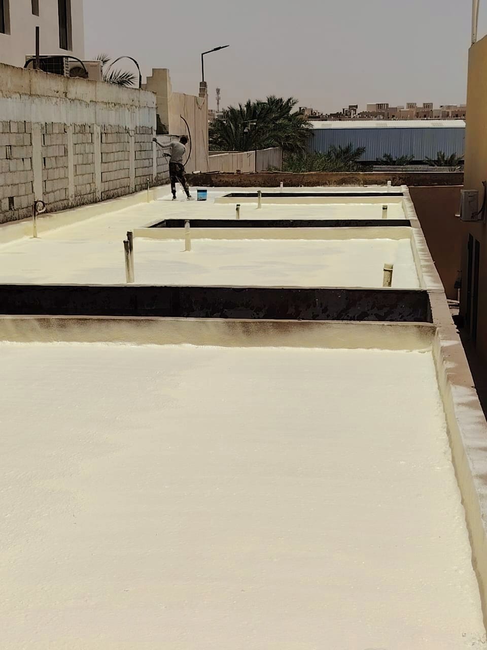 نتيجة عزل سطح مبنى تجاري بحائل